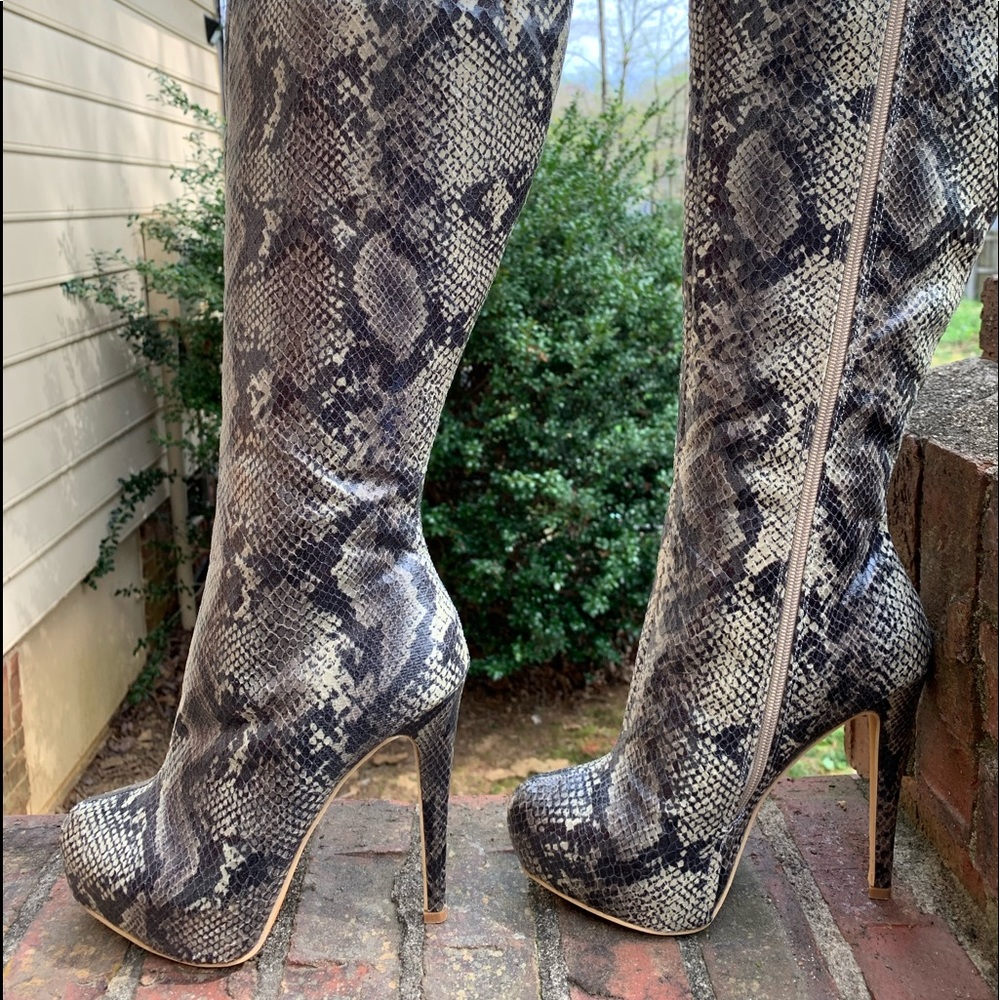 Snakeskin knee high boots
